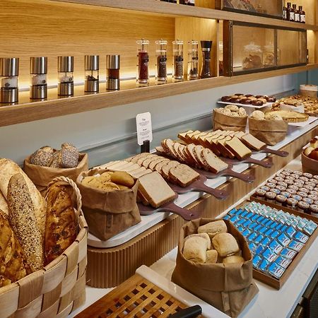 Palacio De Aviles Affiliated By Melia Екстер'єр фото Bread and pastry at a buffet