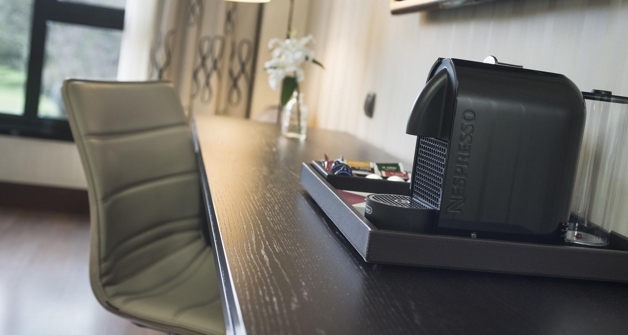 Palacio De Aviles Affiliated By Melia Екстер'єр фото A Nespresso machine in a hotel