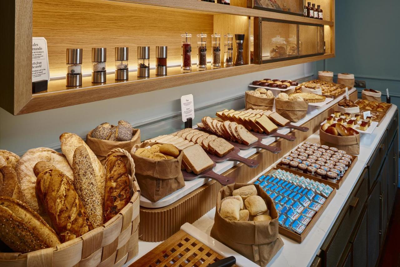 Palacio De Aviles Affiliated By Melia Екстер'єр фото Bread and pastry at a buffet
